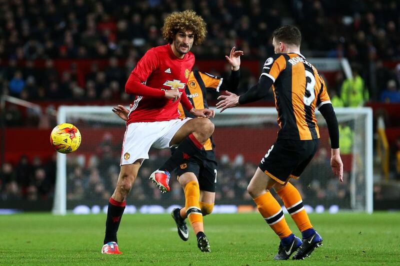 Marouane Fellaini of Manchester United and Andrew Robertson of Hull City during the League Cup semi-final first leg at Old Trafford in Manchester on January 10th, 2017. Matt McNulty / Sportimage