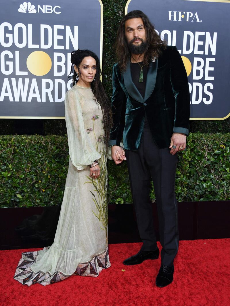 Actor Jason Momoa and wife Lisa Bonet arrive for the 77th annual Golden Globe Awards. AFP