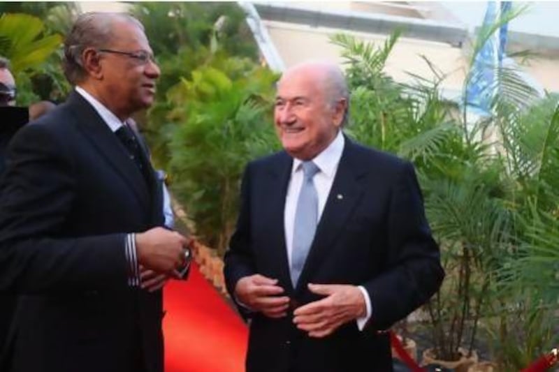 Sepp Blatter arrives with Navin Ramgoolam, left, the prime minister of Mauritius for the Fifa congress. A third of its executive members have been replaced but Blatter, 77, wants to stay on to his 80s.