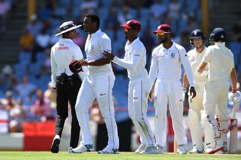GROS ISLET, SAINT LUCIA - FEBRUARY 11:  Shannon Gabriel (L) of the West Indies is ushered away by Kraigg Brathwaite of the West Indies after confronting Joe Root and Joe Denly of England during Day Three of the Third Test match between the West Indies and England at Darren Sammy Cricket Ground on February 11, 2019 in Gros Islet, Saint Lucia. (Photo by Shaun Botterill/Getty Images)