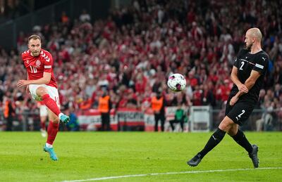 Denmark midfielder Christian Eriksen shoots in the Uefa Nations League League A Group 1 match against Austria on June 13, 2022.  AFP)  