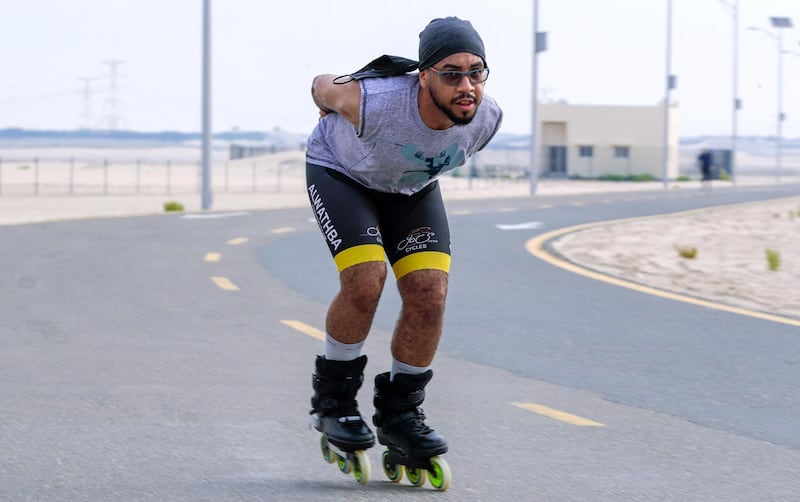 Abu Dhabi, United Arab Emirates, August 21, 2020.   The Madrollers skating group at the Al Wathba Bicycle Track do a  8 km. fun sprint.
  The skating group has members from Dubai and Abu Dhabi.  They encourage safety and discipline on roller-skates, skateboard, long-board and bicycles.  --  Team leader, MJ finishes the 8 km. run.
Victor Besa /The National
Section:  Photo Project
Reporter: