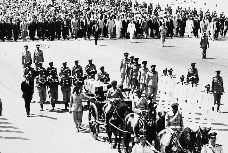 The coffin containg the body of assassinated Egyptian president Anwar Sadat (1918 - 1981), traveling on a gun-carriage, is followed by heads of state to its resting place, Cairo, Egypt, October 9, 1981. (Photo by Hulton Archive/Getty Images)