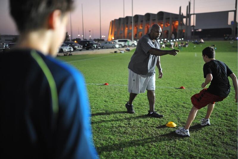 The EAFL season starts next month but Tony Robinson, who moved to the UAE in August, has been working out with Abu Dhabi Wildcat players for the past few weeks. Delores Johnson / The National

