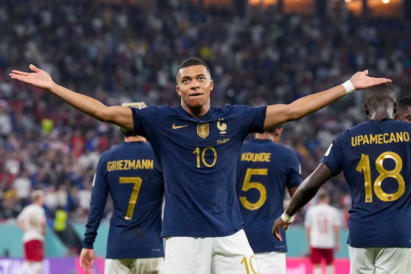 Kylian Mbappe celebrates scoring for France against Denmark during the 2022 World Cup in Qatar. AP