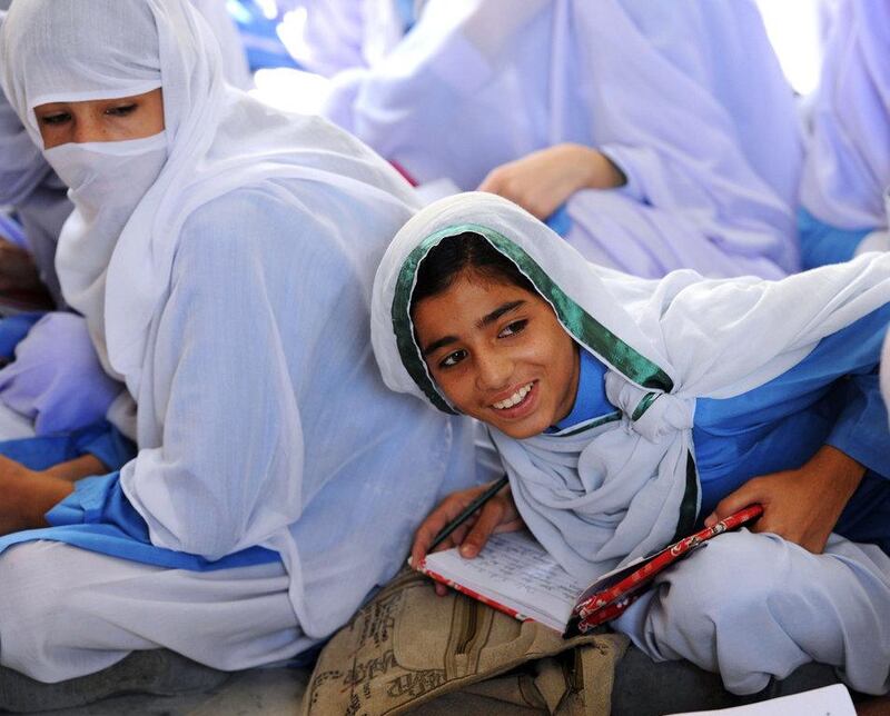 Former classmates at Malala Yousafzai’s hometown of Mingora in Pakistan in September 2013. It was thought she was going to win the Peace Prize in 2013. Aamir Quereshi / AFP Photo