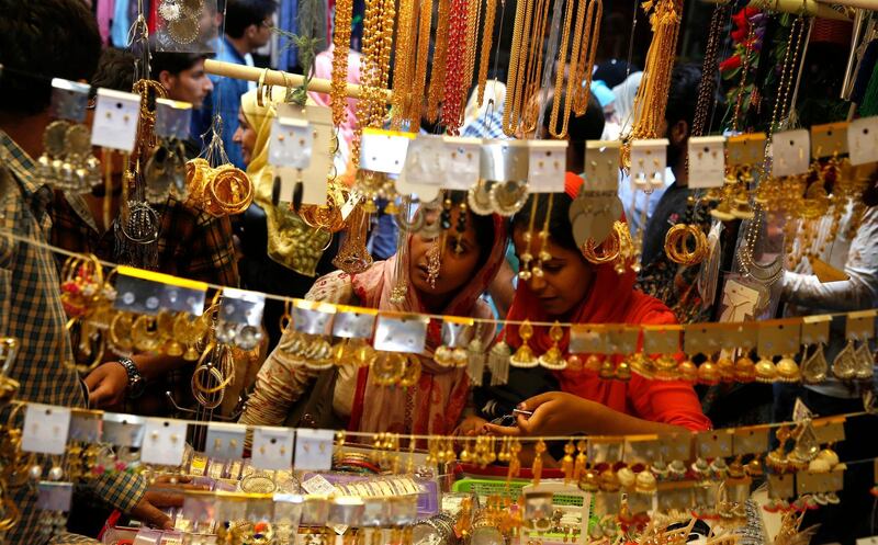 People go shopping ahead of the Muslim festival of Eid Al Fitr in Srinagar, the summer capital of Kashmir, India. EPA