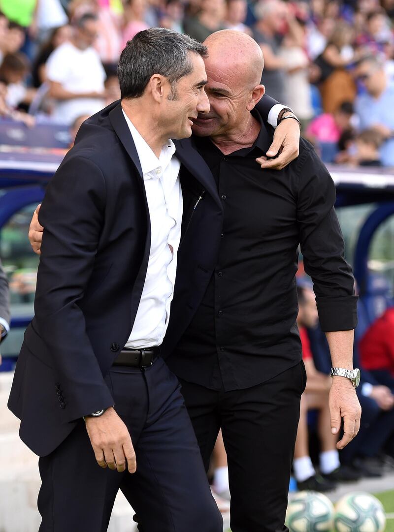 Barcelona manager Ernesto Valverde and Paco Lopez, manager of Levante, after the match in Valencia. Getty Images