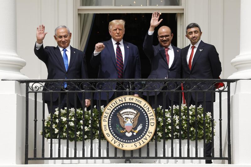 Bloomberg Best of the Year 2020: Benjamin Netanyahu, Israel's prime minister, from left, U.S. President Donald Trump, Abdullatif bin Rashid Al Zayani, Bahrain's foreign affairs minister, and Sheikh Abdullah bin Zayed bin Sultan Al Nahyan, United Arab Emirates' foreign affairs minister, during an Abraham Accords signing ceremony event on the South Lawn of the White House in Washington, D.C., U.S., on Tuesday, Sept. 15, 2020. Photographer: Yuri Gripas/Abaca/Bloomberg