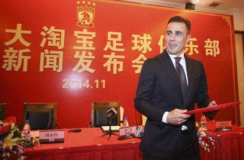 Fabio Cannavaro is introduced on Wednesday as Guangzhou Evergrande's new 'executive head coach' in Guangdong, China. Reuters / November 5, 2014