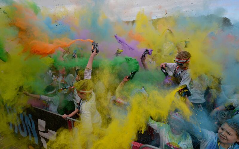 Runners participate in the annual Color Run in Centennial Park in Sydney. The Color Run is a 5km fun run started in the US in 2012 and is inspired by the traditional Hindu festival Holi, where people throw natural coloured powders as the seasons change from winter to spring. Peter Parks / AFP