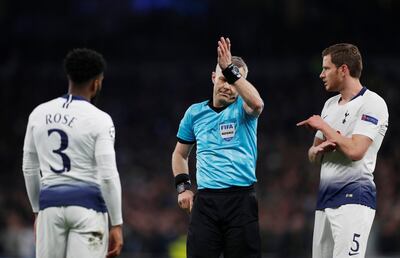 Soccer Football - Champions League Quarter Final First Leg - Tottenham Hotspur v Manchester City - Tottenham Hotspur Stadium, London, Britain - April 9, 2019  Referee Bjorn Kuipers awards a penalty to Manchester City after reviewing an incident with VAR        Action Images via Reuters/Paul Childs