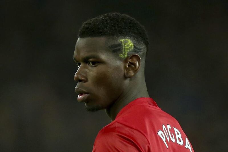 Manchester United's Paul Pogba sports a new haircut design during the English Premier League match against Liverpool at Old Trafford in Manchester, England, Sunday, January 15, 2017. Dave Thompson / AP Photo