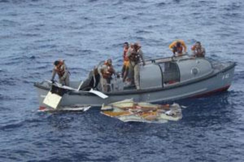 Officers from Brazil's Air Force recover debris belonging to the Air France Flight 447 in the Atlantic Ocean, on June 7 2009.
