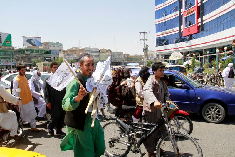 A man sells Taliban flags in western province Herat.