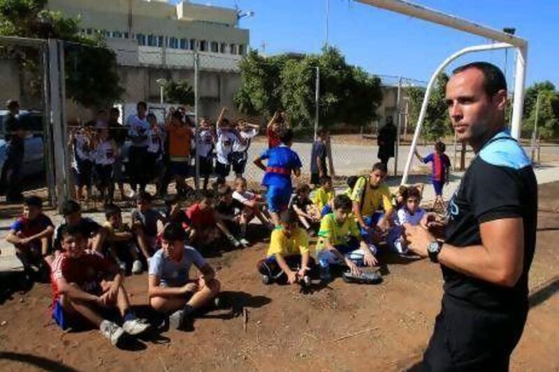 Manchester City Football Academy's Alan Dixon, right, said the four-day camp gave the Palestinian and Lebanese children a chance to not just have fun and relieve stress but learn some life lessons on communicating and working within a team.