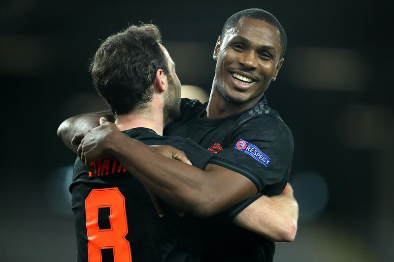 LINZ, AUSTRIA - MARCH 12: (FREE FOR EDITORIAL USE) In this handout image provided by UEFA, Juan Mata of Manchester United celebrates with Odion Ighalo after scoring his team's third goal during the UEFA Europa League round of 16 first leg match between LASK and Manchester United at Linzer Stadion on March 12, 2020 in Linz, Austria. The match is played behind closed doors as a precaution against the spread of COVID-19 (Coronavirus).  (Photo by UEFA - Handout/UEFA via Getty Images )