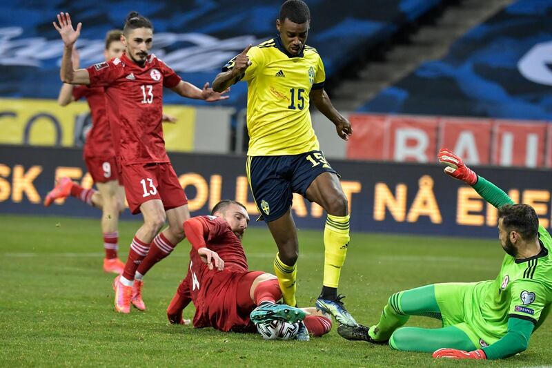 Sweden's Alexander is denied by Georgia goalkeeper Giorgi Loria. EPA