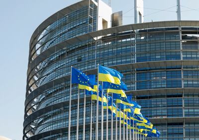 Ukrainian flags were hoisted next to EU flags to show solidarity with Ukraine in March. EPA