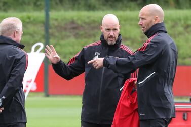 MANCHESTER, ENGLAND - JULY 04: (EXCLUSIVE COVERAGE) Coach Steve McClaren, Manager Erik ten Hag, Coach Mitchell van der Gaag of Manchester United in action during a first team training session at Carrington Training Ground on July 04, 2022 in Manchester, England. (Photo by Tom Purslow/Manchester United via Getty Images)