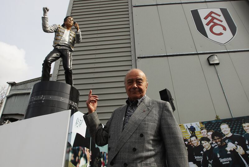 Mohamed Al Fayed unveils a statue in tribute to Michael Jackson at Fulham FC's Craven Cottage stadium in 2011.
