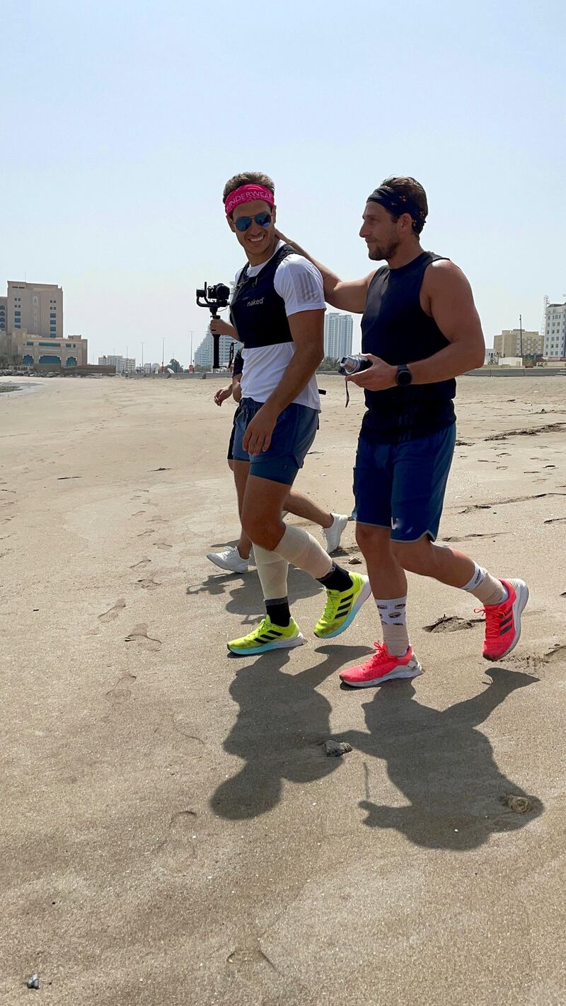 Burgess walked the last kilometre with his brother, whom he describes as his 'main support person'