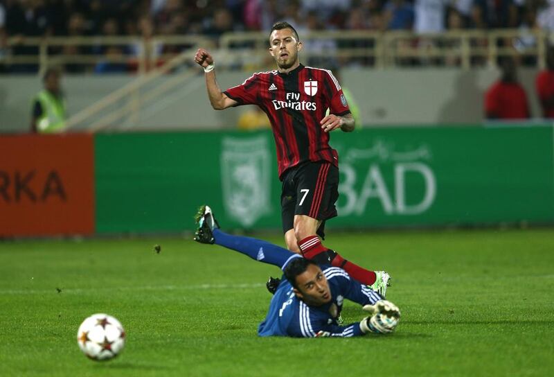 Jeremy Menez, top, of AC Milan scores  during the Dubai Football Challenge match between AC Milan and Real Madrid at The Sevens Stadium on December 30, 2014 in Dubai, United Arab Emirates.  (Photo by Warren Little/Getty Images)