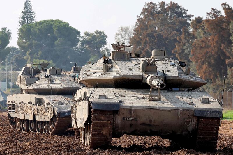 Israeli tanks on the border of southern Israel and the Gaza Strip on January 2, 2024. The Israeli military says reservists are returning to civilian life as the financial burden of war against Gaza is felt AFP