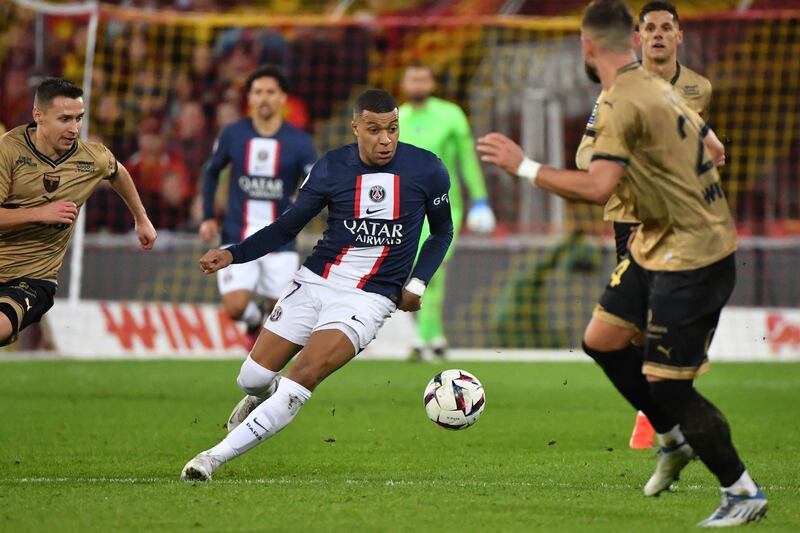 Paris Saint-Germain's Kylian Mbappe runs with the ball. AFP