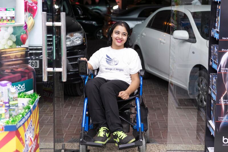 DUBAI, UNITED ARAB EMIRATES, NOVEMBER 3, 2016. 
Shobhika Kalra, uses the newly installed ramp at Aster Pharmacy, next to her home. 

Her group "Wings of Angelz", co-founded with her sister Ruchika, campaigns for more ramps to be built around the city. 

Photo: Reem Mohammed (Reporter: Ramola Talwar / Section: NA) JOB ID  84514 *** Local Caption ***  RM_20161102_ANGELZ_001.JPG