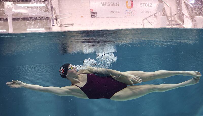 Aliena Schmidtke, member of the German national team, swims in a flow passage during a technique analysis at the Institute for Applied Training Science (IAT) in Leipzig, eastern Germany, on January 26, 2021. AFP