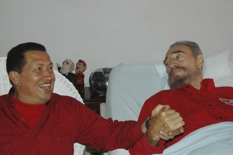 Venezuela’s president Hugo Chavez visits Fidel Castro during his recuperation from surgery in Havana. Castro died eight years after ill health forced him to formally hand power over to his younger brother Raul. Granma via AP