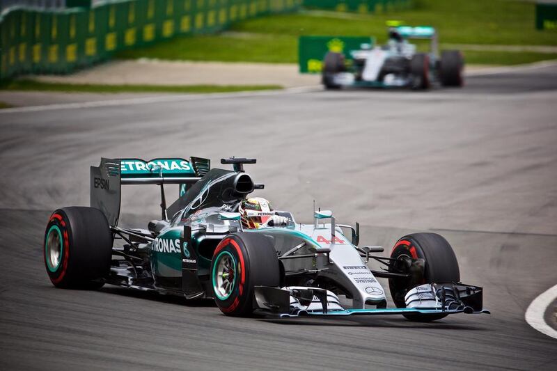 Lewis Hamilton (front) of Mercedes-GP and teammate Nico Rosberg at the Canada Formula One Grand Prix, 07 June 2015.  EPA