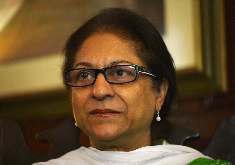 (FILES) In this photograph taken on October 4, 2014, Pakistani human rights activist and Supreme Court lawyer Asma Jahangir gestures during an interview with AFP in Lahore.
Leading Pakistani human rights advocate Asma Jahangir has died, a family member said on February 11, in a stinging blow to the country's embattled rights community. She was 66. The lawyer and former UN special rapporteur on religion suffered cardiac arrest and died within the hour, according to her sister. / AFP PHOTO / ARIF ALI
