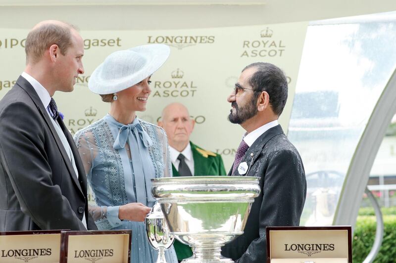 Sheikh Mohammed bin Rashid speaks with Prince William, Duke of Cambridge; and Catherine, Duchess of Cambridge. Wam