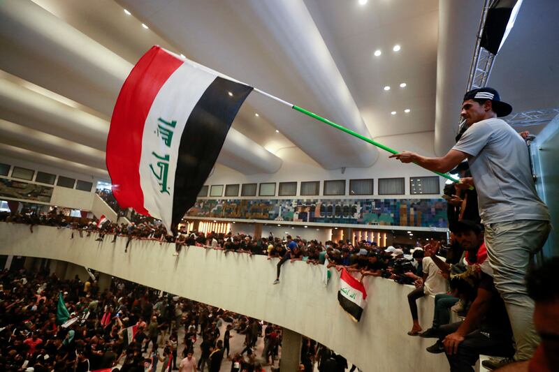 The Iraqi Parliament, besieged by supporters of cleric Moqtada Al Sadr in 2022, is in need of checks and balances. AFP