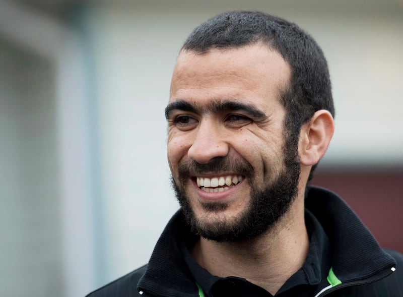 Omar Khadr speaks to the media outside his lawyer's home in Edmonton, Alberta on May 7, 2017. Nathan Denette / The Canadian Press via AP