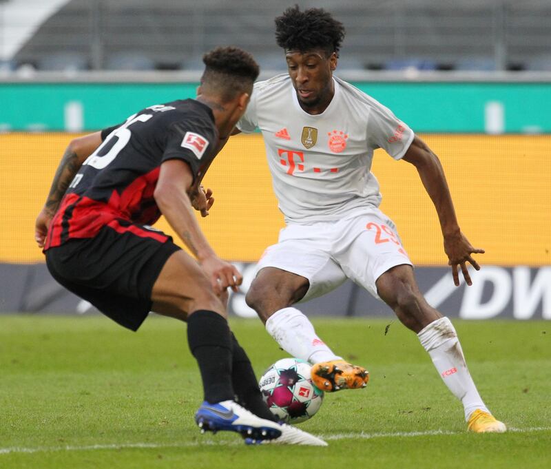 Bayern Munich's Kingsley Coman runs at the Frankfurt defence. Reuters