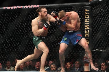  Conor McGregor moves in for a hit against Donald Cerrone during UFC 246 at T-Mobile Arena in Las Vegas. Reuters