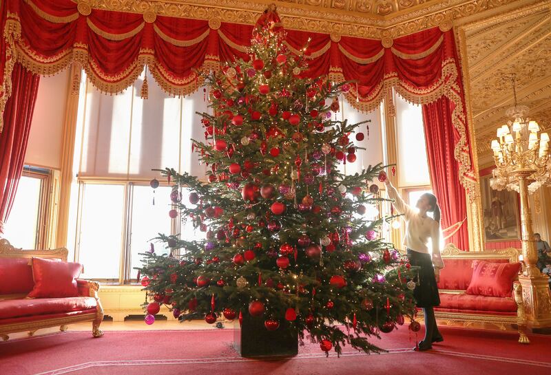 On Thursday staff were seen preparing Windsor Castle's Christmas decorations. The decorations can be seen from November 25 until the January 3, 2022. Getty Images