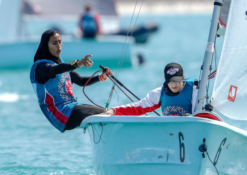 Abu Dhabi, March 20, 2019.  Special Olympics World Games Abu Dhabi 2019.  Sailing Level 1.--  Salama Al Mansoori instruct and Mark Meerberg during the race.
Victor Besa/The National