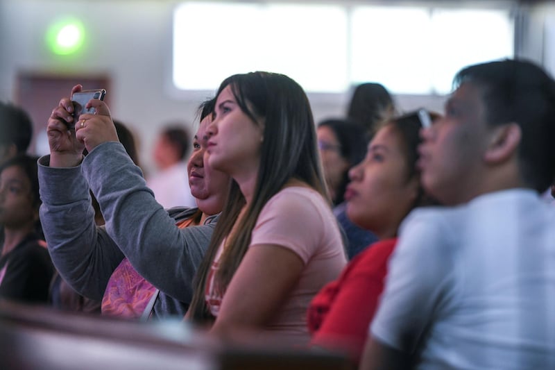 Abu Dhabi, United Arab Emirates - Worshippers view the historic Papal mass at St. JosephÕs Cathedral on February 5, 2019. Khushnum Bhandari for The National