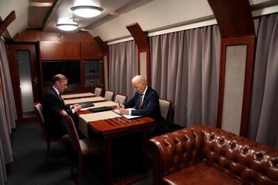 US President Joe Biden on a train with National Security Adviser Jake Sullivan as he goes over his speech marking one year of war in Ukraine after a surprise visit with the country's President, Volodymyr Zelenskyy
