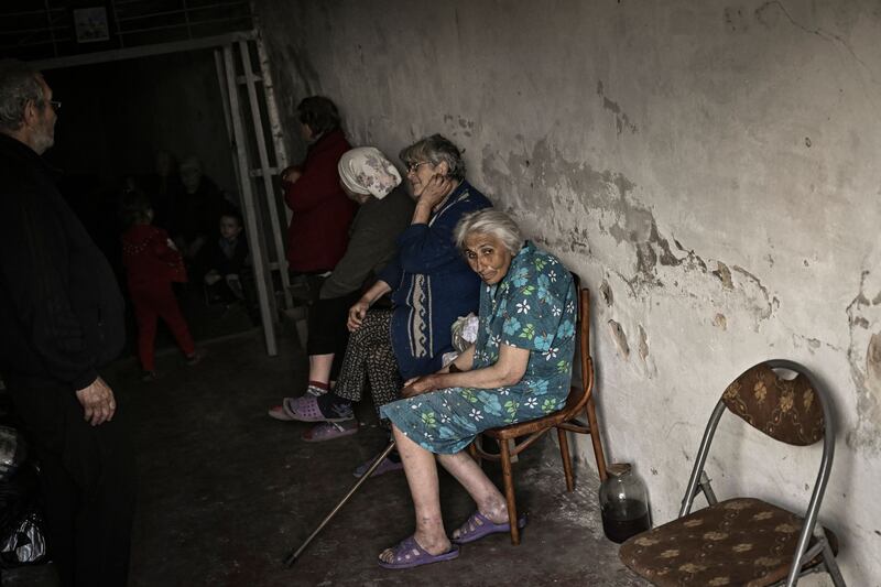 People hide in a bomb shelter in the city of Lysychansk in the Donbas region. AFP