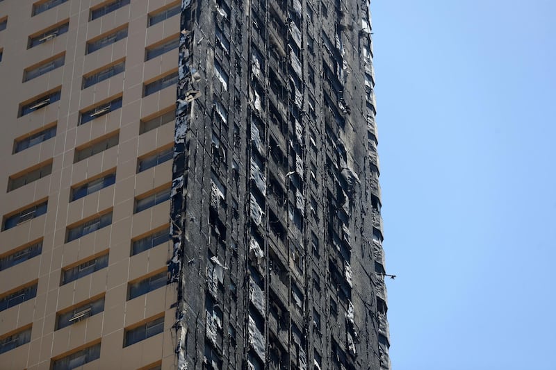 Sharjah, United Arab Emirates - Reporter: N/A: Fire. General View of Abbco Tower after a massive fire last night. Wednesday, May 6th, 2020. Sharjah. Chris Whiteoak / The National