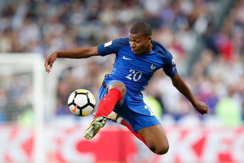 Kylian Mbappe controls the ball while playing for France in a World Cup qualifier against the Netherlands in 2017. AP