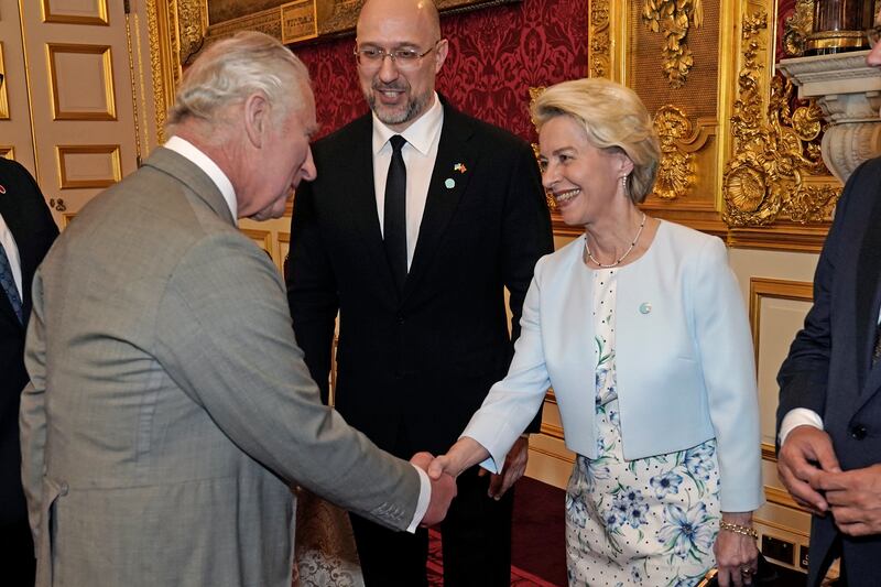 King Charles speaks with President of the European Commission Ursula von der Leyen during the reception. AP