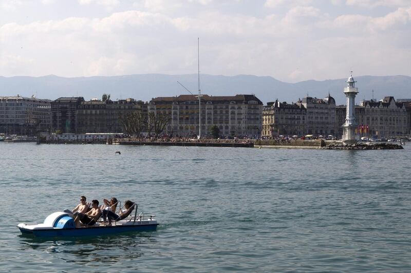 8th: Geneva. Pictured, people on a pedalo enjoy the sunshine on Lake Geneva.  EPA