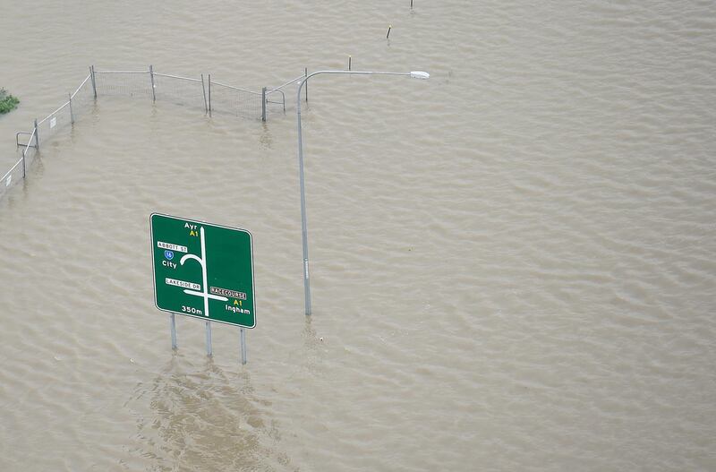 A partially submerged sign in Townsville. Getty Images