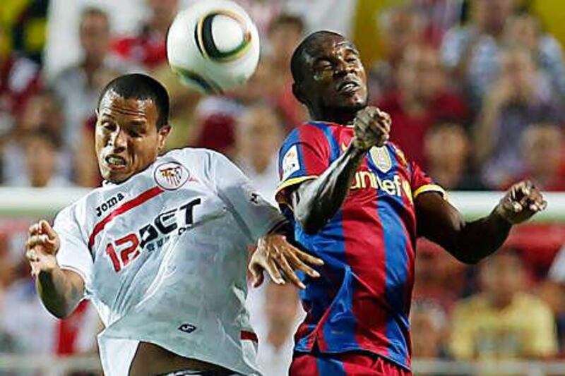 Luis Fabiano, left, the Sevilla striker, heads Tottenham's wanted list.